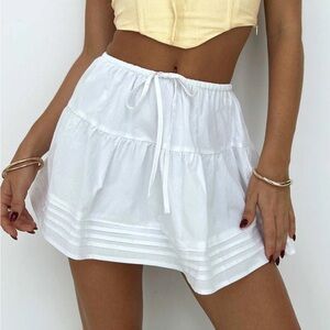 White mini skirt